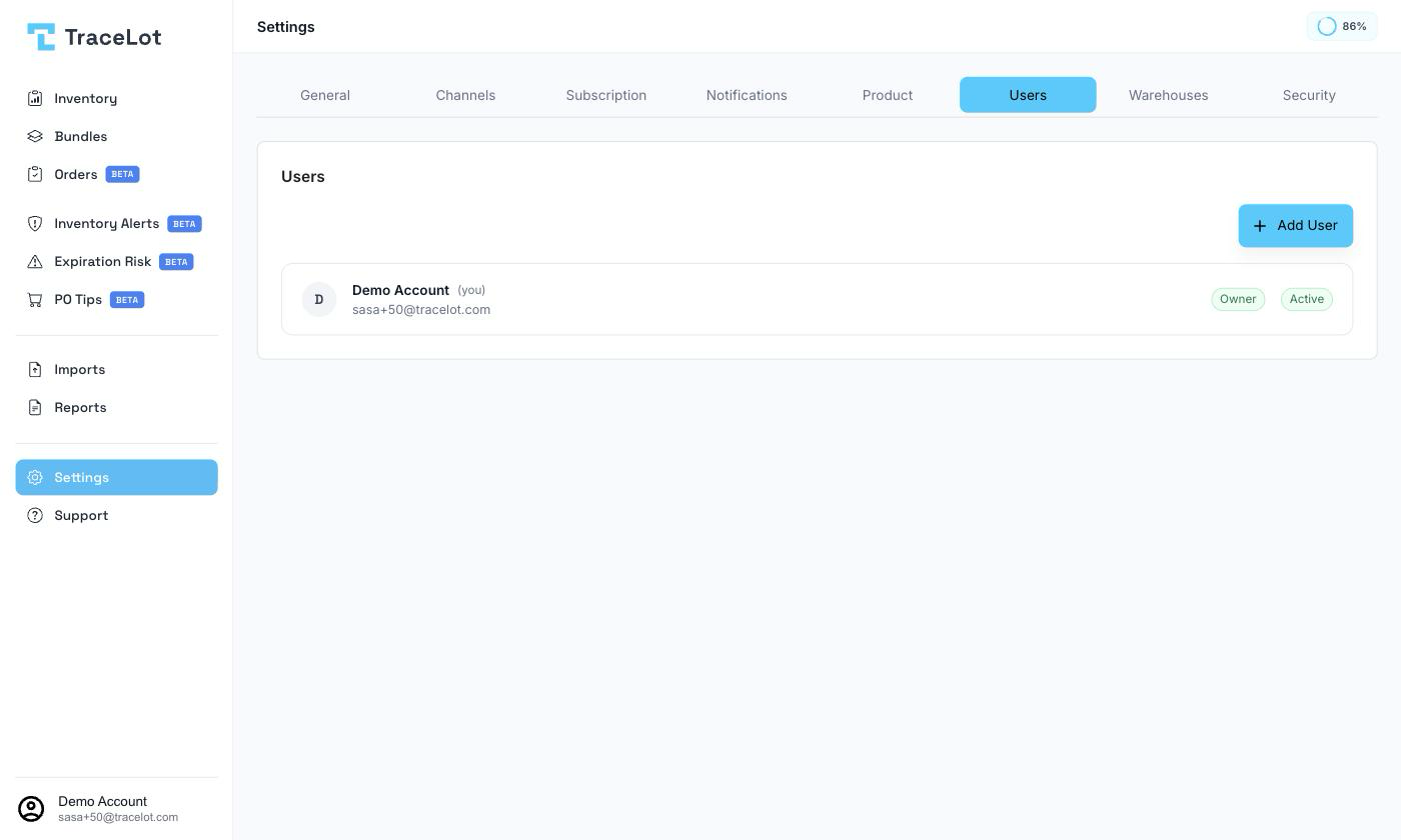 The Users settings tab showing user rows with role and status badges